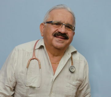 a man with a stethoscope on his neck